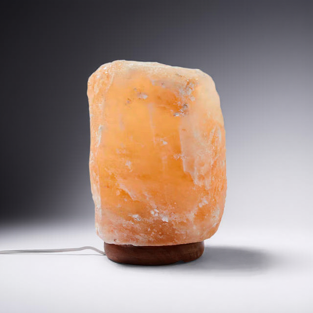 Himalayan salt lamp on a gray background